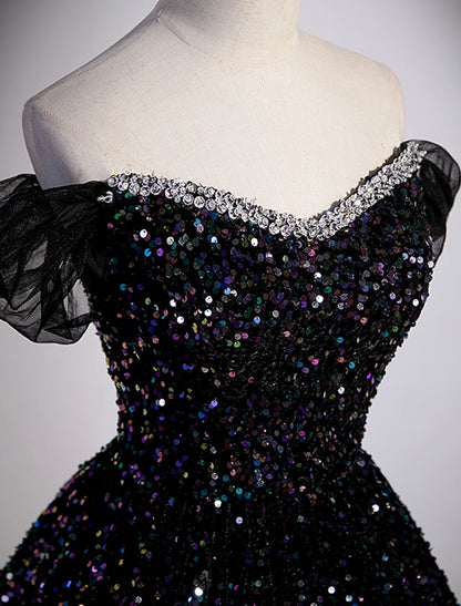 Close-up detail of the shimmering sequins and delicate pleats.