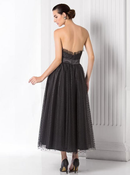 Elegant Ball Gown Sweetheart Tulle Black Tea Length Holiday Dress with Sash.