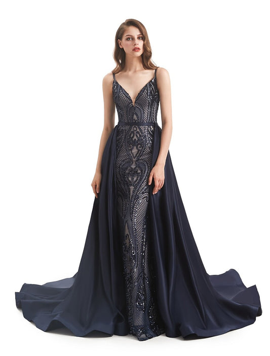Woman wearing an elegant detachable sequin mermaid trumpet evening gown.