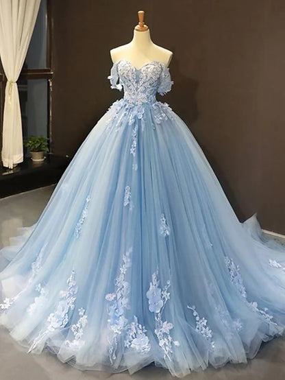 Back view of light blue floral lace ball gown with court train and appliques.