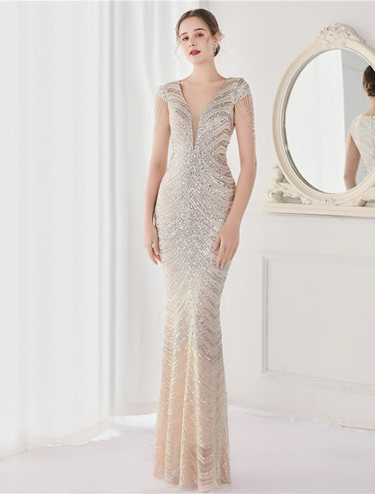 Back view of the sequined mermaid trumpet gown, highlighting the V-back design.