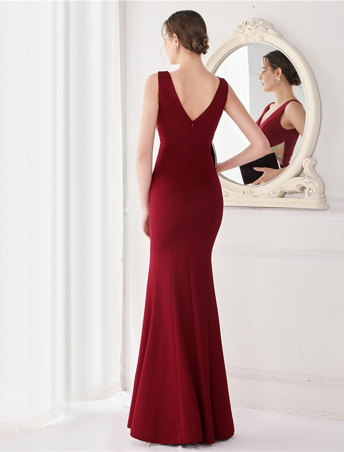 Mermaid V-neck evening gown in stretch satin, side view.