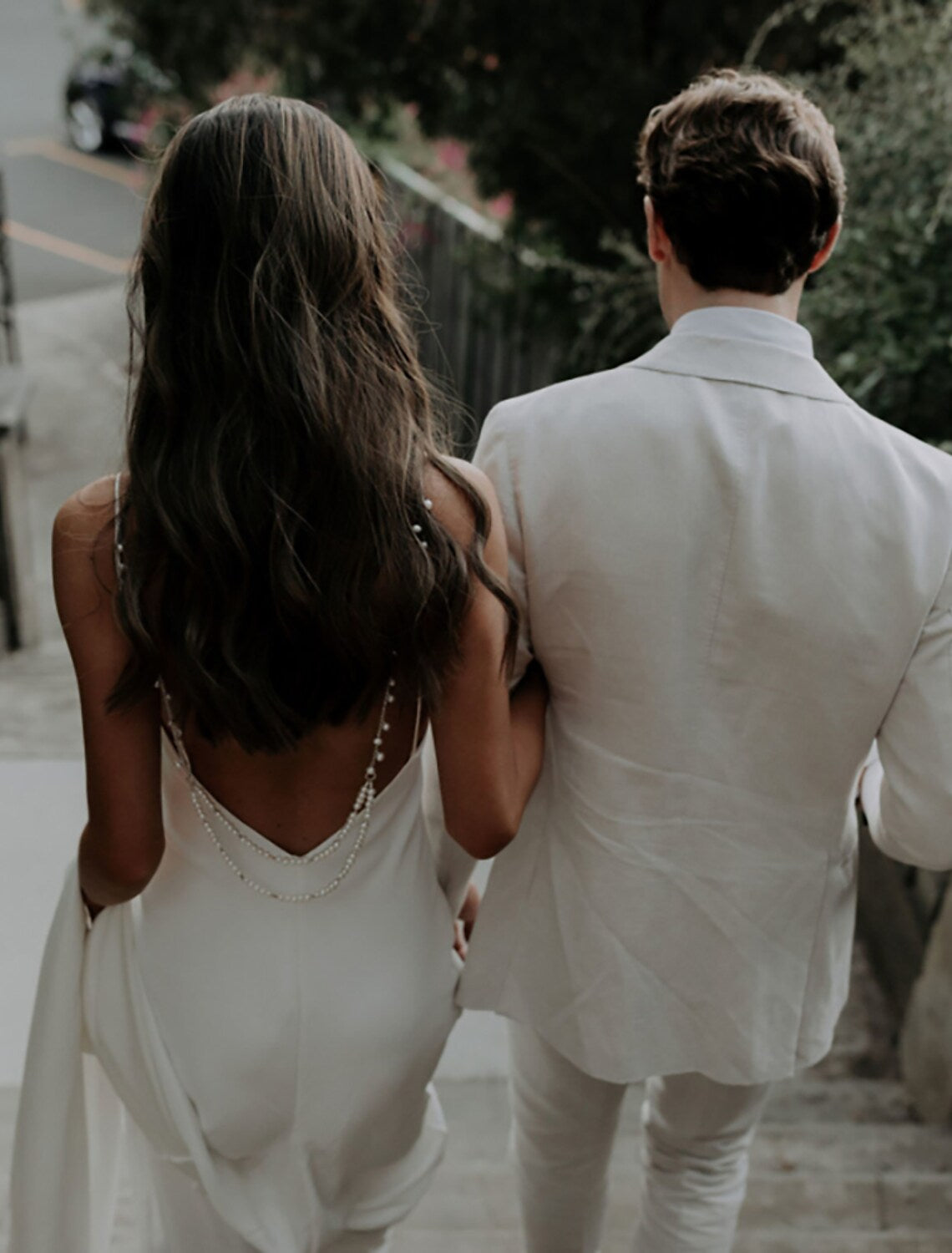 Elegant Mermaid V-Neck Spaghetti Strap Open Back Wedding Dress with Pearls.