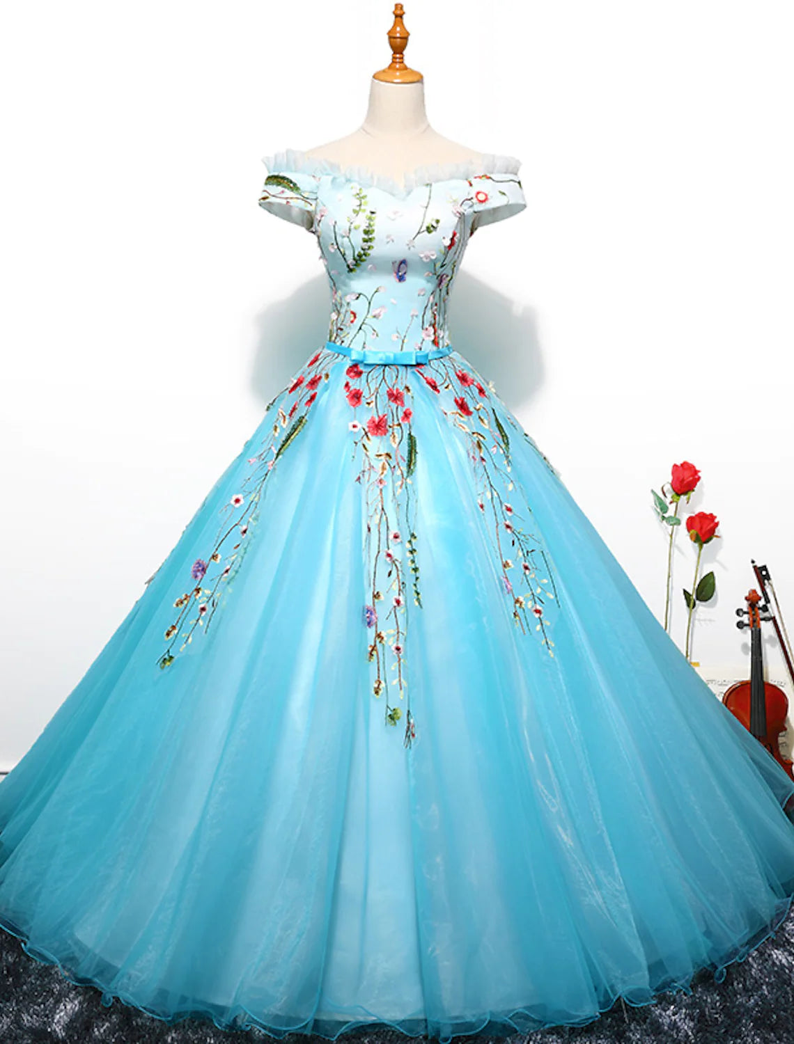 Elegant off-shoulder short sleeve tulle embroidered ball gown for prom or quinceanera.