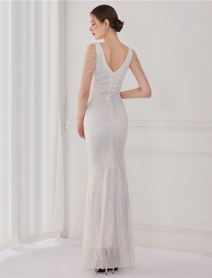 Woman wearing a sparkling floor-length evening dress.