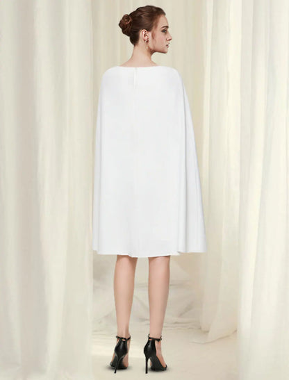 Elegant Sheath Column Jewel Neck Sleek Navy Knee Length Cocktail Dress.