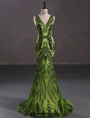 Elegant sparkling mermaid V-neck sleeveless evening gown with court train.