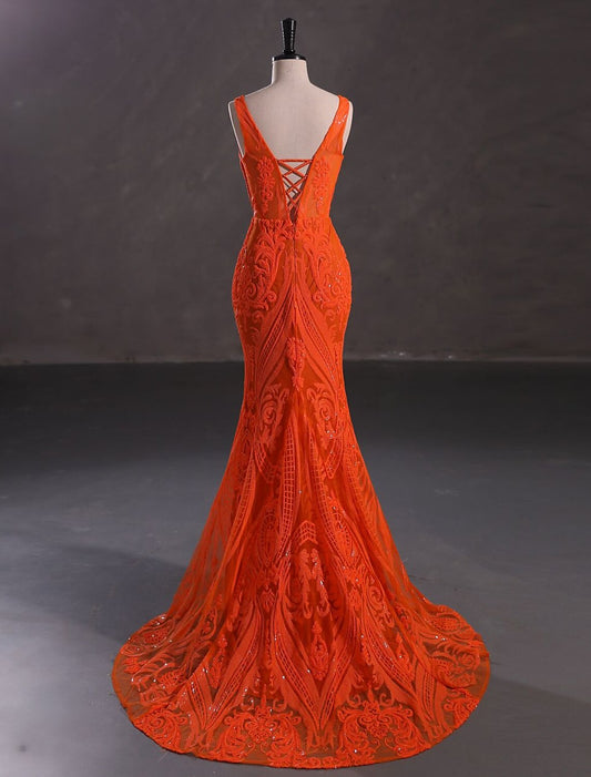 Elegant sparkling mermaid V-neck sleeveless evening gown with court train.