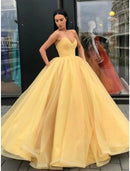 Elegant strapless ball gown with pleated tulle.