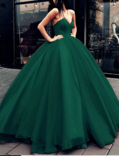 Tulle ball gown with sleek pleats, suitable for quinceaneras.