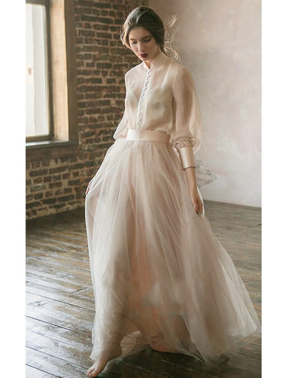 Elegant Two-Piece Empire Stand Collar Long Sleeve Tiered Chiffon Gown.