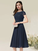 Flirty A-Line Jewel Neck Short Sleeve Pleated Chiffon Tea Length Homecoming Dress.
