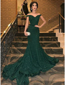 Glamorous mermaid off-shoulder short sleeve gold sequin court train evening gown.