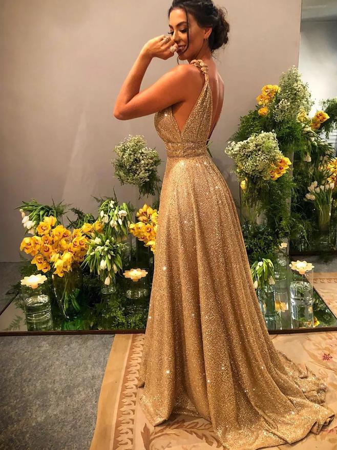 Luxurious A-Line Spaghetti Strap Backless Sequin Prom Dress with Sweep Train.