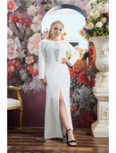 Model wearing a sparkling A-line long sleeve jewel neck evening gown with a slit.