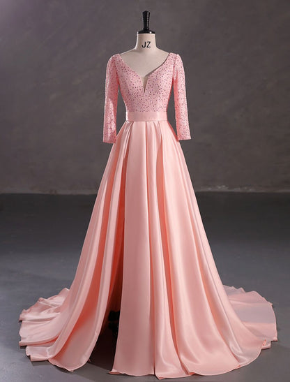 Sequin Evening Gown featuring a Court Train and V-Neck.