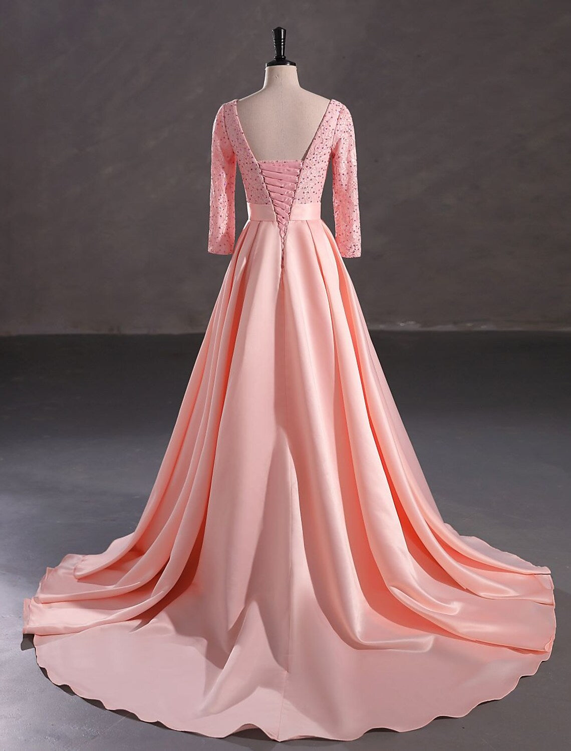 3/4 Sleeve A-Line Gown with Sparkling Sequin Details.