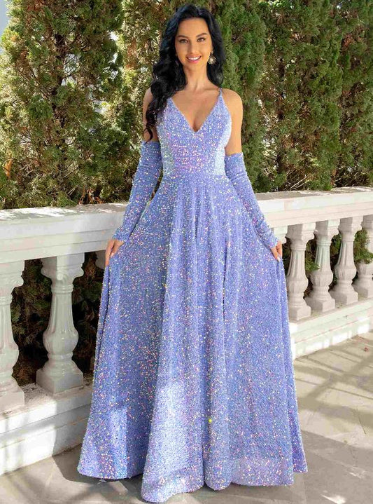 Model wearing a sparkling A-line V-neck sequined pleated floor-length prom dress, front view.