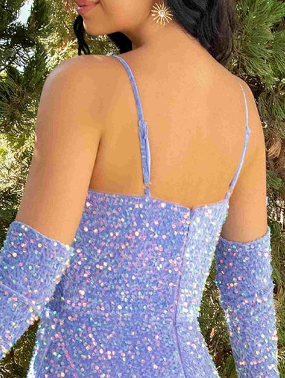 Close-up of the sequined and pleated details on a sparkling A-line V-neck prom dress.