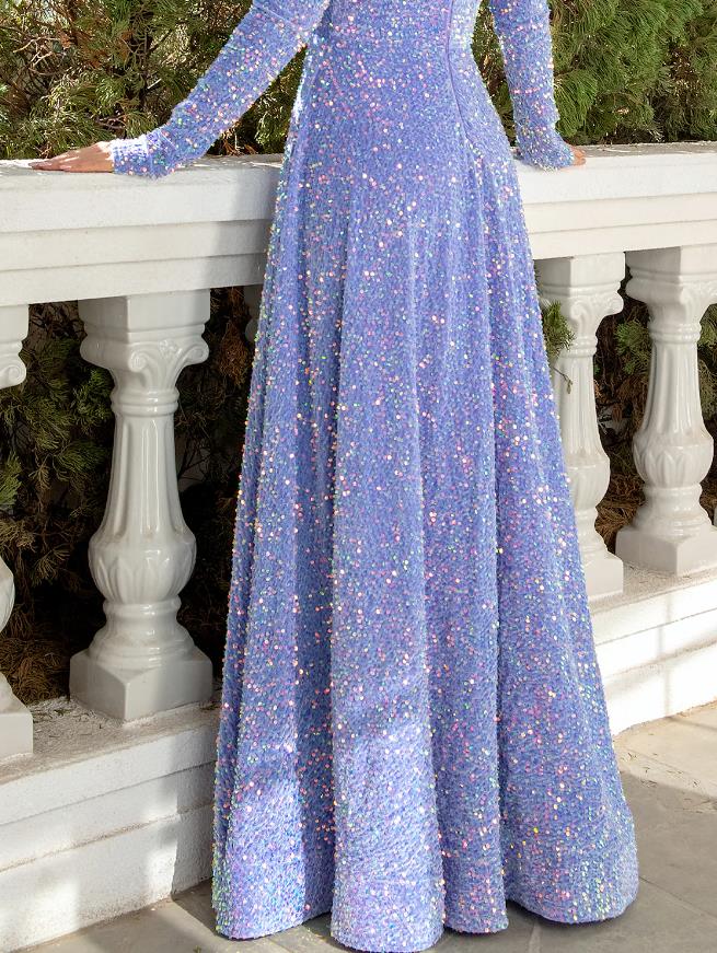 Model walking in a sparkling A-line V-neck sequined pleated floor-length prom dress.
