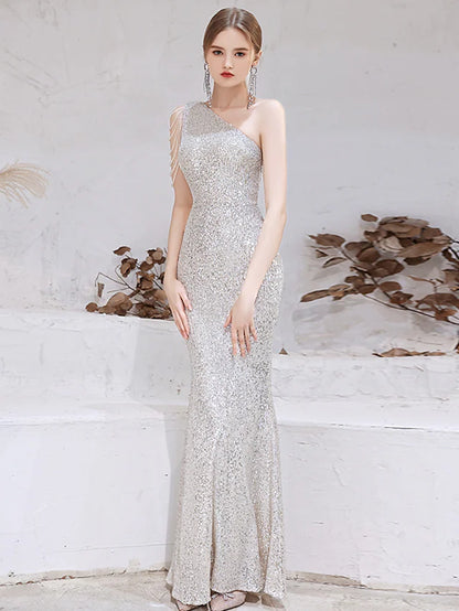Sparkling mermaid one-shoulder evening gown with sequins and beads.