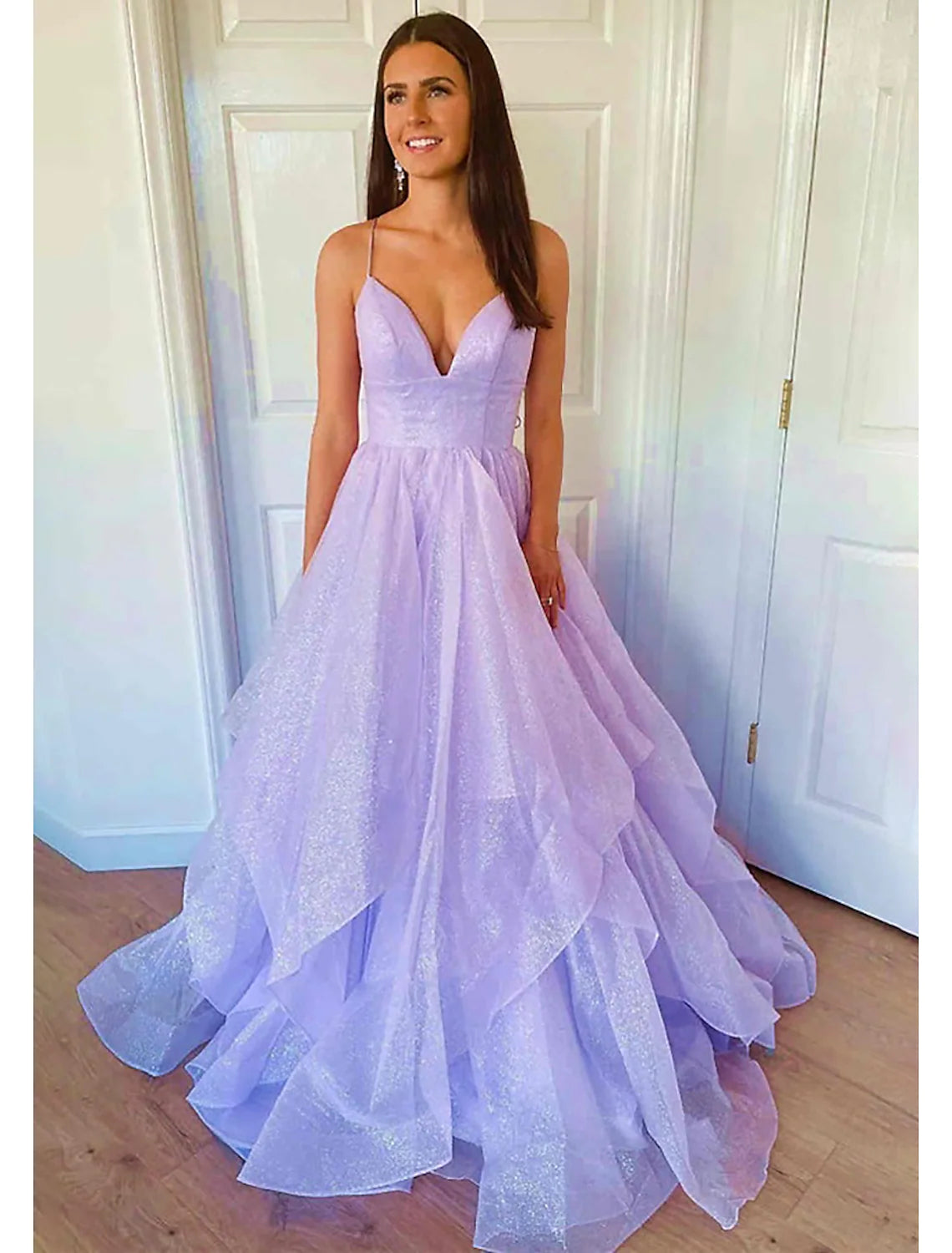 Sparkling sweetheart ball gown prom dress, front view.