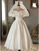 Vintage A-Line Off Shoulder Satin Bow Tea Length Wedding Gown.