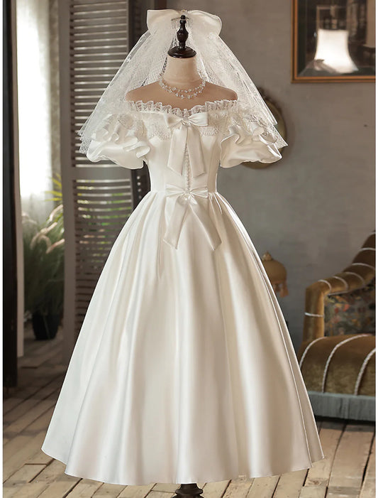 Vintage A-Line Off Shoulder Satin Bow Tea Length Wedding Gown.